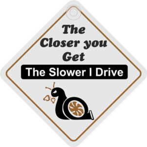 THE CLOSER YOU GET THE SLOWER I DRIVE SIGN